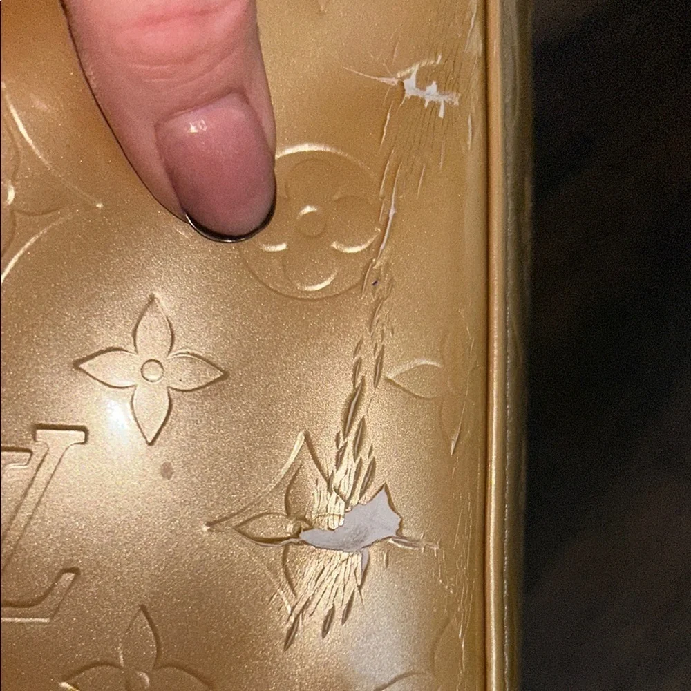 LOUIS VUITTON Gold Tote with Iconic Embossed Design